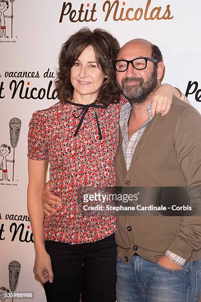 Valerie Lemercier and Kad Merad attend the 'les vacances du petit Nicolas' Premiere at Cinema Gaumont Capucine, in Paris.