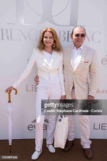 Michel Corbiere and actress Cyrielle Clair attend the 'Brunch Blanc' hosted by Barriere Group. Held on Yacht 'Excellence' on June 29, 2014 in Paris,...