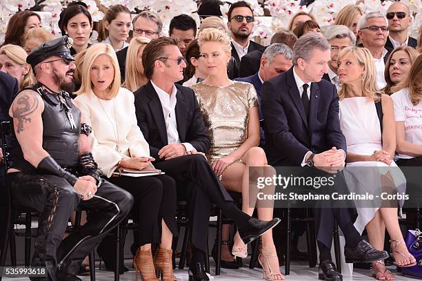 Peter Marino, Princess Marie Chantal of Greece, Sean Penn, Charlize Theron, Bernard Arnault, Helene Arnault - Christian Dior show during the Paris...