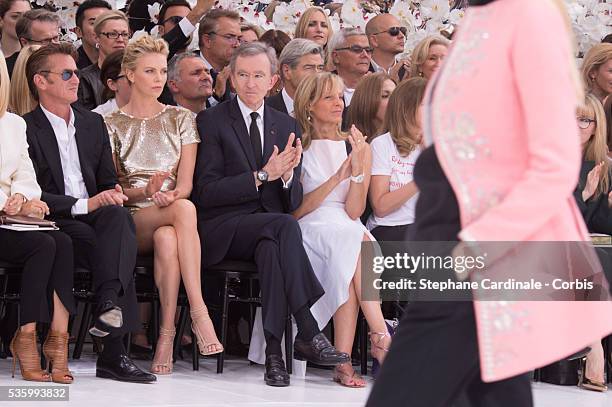 Sean Penn, Charlize Theron, Bernard Arnault, Helene Arnault - Christian Dior show during the Paris Fashion Week - Haute Couture Fall/Winter 2014-2015