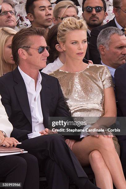 Sean Penn and Charlize Theron - Christian Dior show during the Paris Fashion Week - Haute Couture Fall/Winter 2014-2015