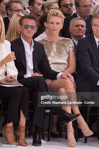 Sean Penn and Charlize Theron - Christian Dior show during the Paris Fashion Week - Haute Couture Fall/Winter 2014-2015