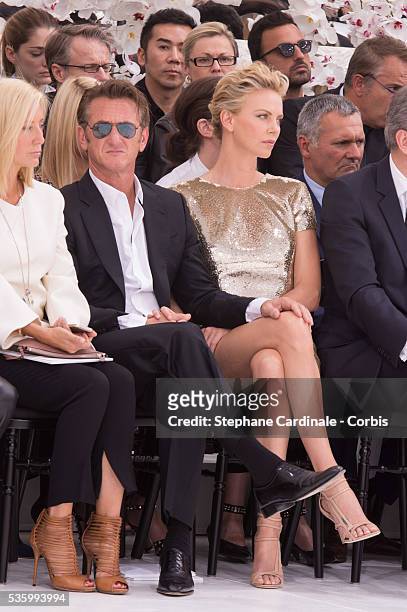 Sean Penn and Charlize Theron - Christian Dior show during the Paris Fashion Week - Haute Couture Fall/Winter 2014-2015
