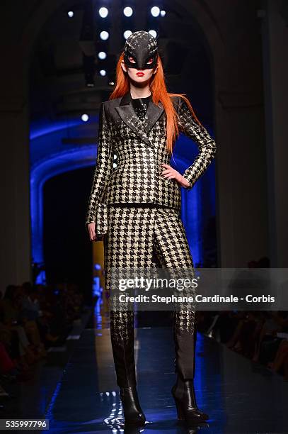 Model walks the runway at the Jean Paul Gaultier show during the Paris Fashion Week - Haute Couture Fall/Winter 2014-2015