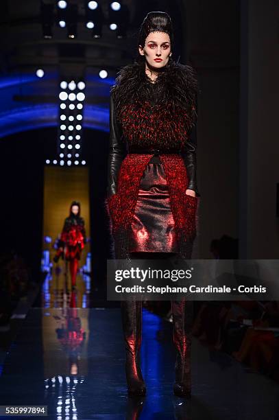 Model walks the runway at the Jean Paul Gaultier show during the Paris Fashion Week - Haute Couture Fall/Winter 2014-2015