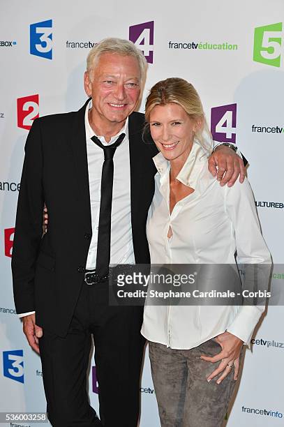Laurent Boyer and Helene Gateau attend 'France Televisions' Photocall at Palais De Tokyo on August 26, 2014 in Paris, France.