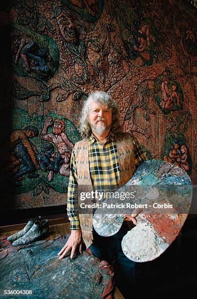 Lord Alexander Thynn, 7th Marquess of Bath, holds his painter's pallet in a room he has decorated with a mural at Longleat House. Lord Thynn himself...