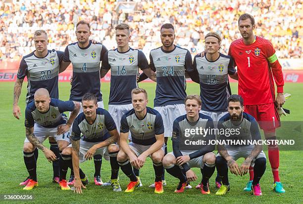 Sweden's forward John Guidetti, defender Andreas Granqvist, midfielder Pontus Wernbloom, forward Isaac Kiese Thelin, midfielder Oscar Hiljemark and...