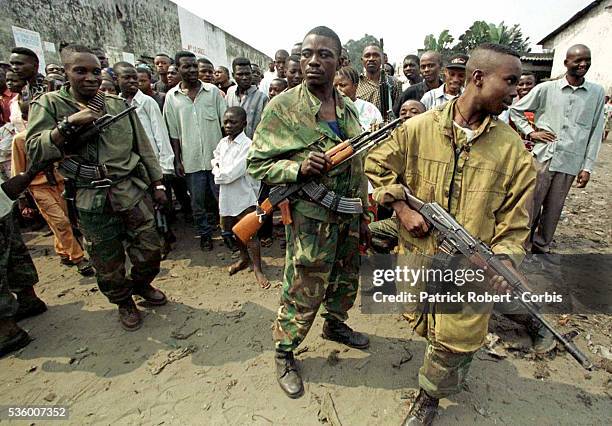 Government soldiers patrolling the streets of Kinshasa which is under their control.