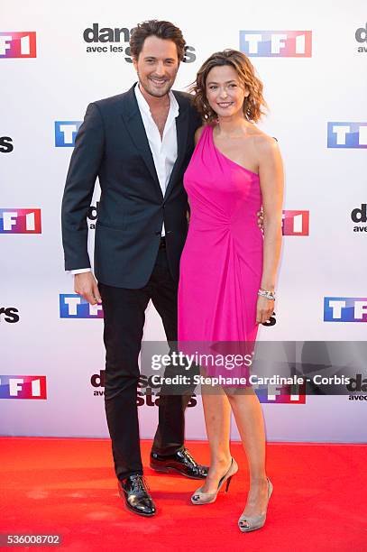 Vincent Cerutti and Sandrine Quetier attend the 'Danse Avec Les Stars 2014' Photocall at TF1 on September 10, 2014 in Paris, France.