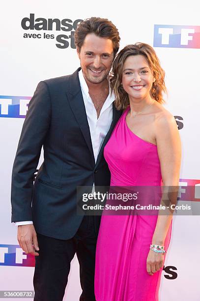 Vincent Cerutti and Sandrine Quetier attend the 'Danse Avec Les Stars 2014' Photocall at TF1 on September 10, 2014 in Paris, France.