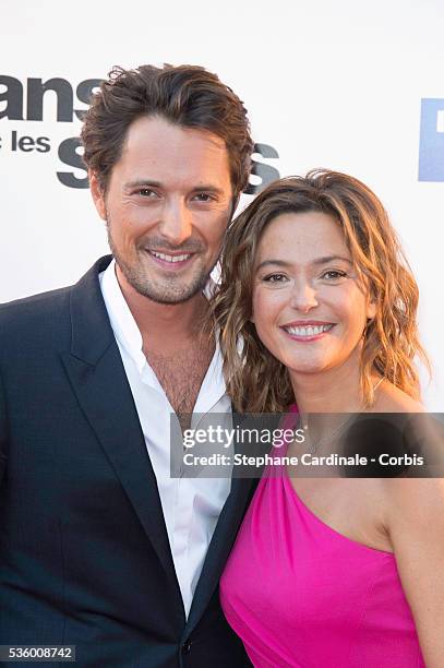 Vincent Cerutti and Sandrine Quetier attend the 'Danse Avec Les Stars 2014' Photocall at TF1 on September 10, 2014 in Paris, France.