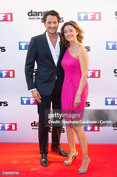 Vincent Cerutti and Sandrine Quetier attend the 'Danse Avec Les Stars 2014' Photocall at TF1 on September 10, 2014 in Paris, France.