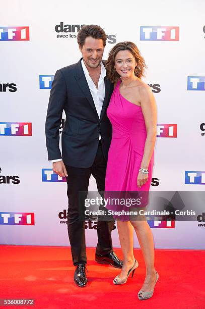 Vincent Cerutti and Sandrine Quetier attend the 'Danse Avec Les Stars 2014' Photocall at TF1 on September 10, 2014 in Paris, France.