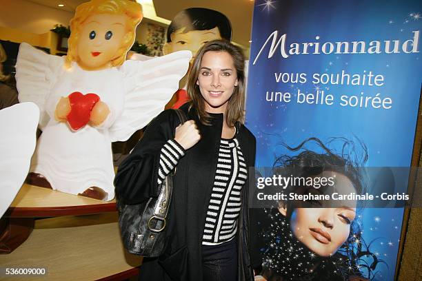 Host Melissa Theuriau attends the "3 Little Angels Lucky Charms" cocktail to benefit of "Unicef", "Reves" and "Paris Tout P'tits" Associations held...