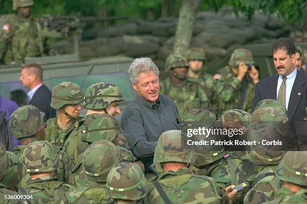 President Bill Clinton visits with American troops in KFOR in Skopje, Macedonia, part of the effort to end the conflict in Kosovo.