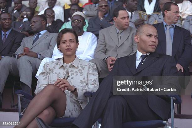 Sindjely and Karim Wade, the President's children.