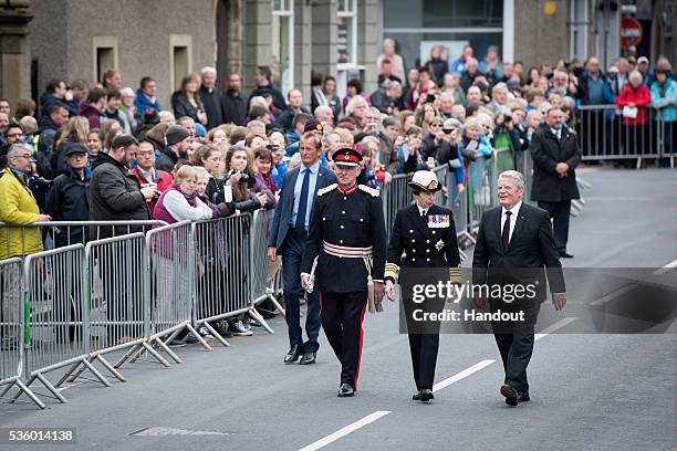 In this handout photo provided by the German Government Press Office , HRH Princess Anne, Princess Royal and German President Joachim Gauck attend...