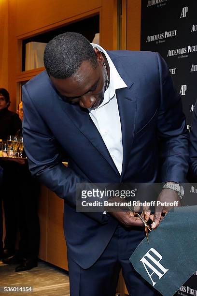 Actor Omar Sy attends the Audemars Piguet Rue Royale Boutique Opening on May 26, 2016 in Paris, France.