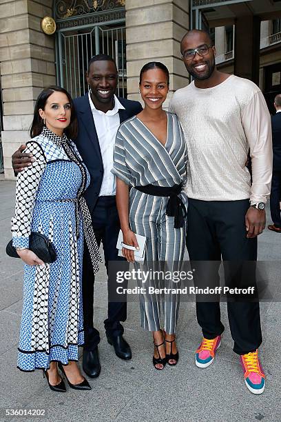 Actor Omar Sy and his wife Helene and Judoka Teddy Riner and his wife Luthna Plocus attend the Audemars Piguet Rue Royale Boutique Opening on May 26,...