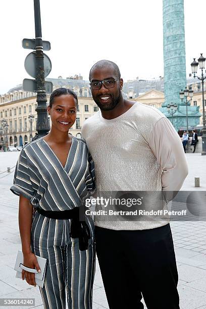 Judoka Teddy Riner and his wife Luhtna Plocus attends the Audemars Piguet Rue Royale Boutique Opening on May 26, 2016 in Paris, France.