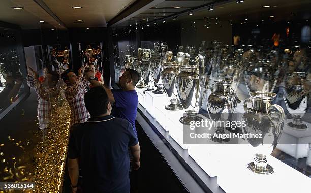 The UEFA Champions League trophies are displayed in Real Madrid museum at Estadio Santiago Bernabeu on May 31, 2016 in Madrid, Spain.