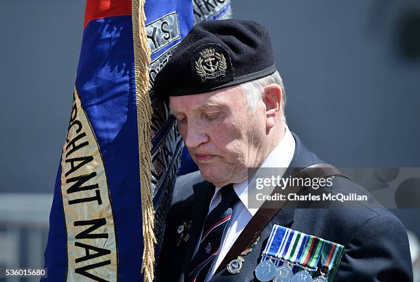 Serviceman bows his head during the prayer service at HMS Caroline on May 31, 2016 in Belfast, Northern Ireland. HMS Caroline is the last surviving...