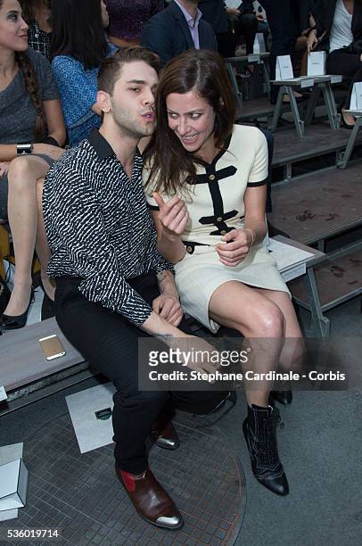 Xavier Dolan and Anna Mouglalis attend the Chanel show as part of the Paris Fashion Week Womenswear Spring/Summer 2015 on September 30, 2014 in...