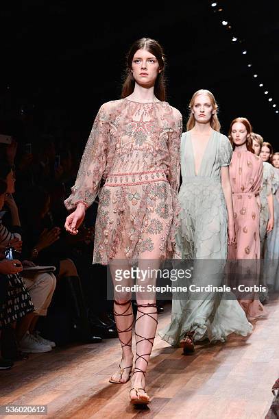 Models walk the runway during the Valentino show as part of the Paris Fashion Week Womenswear Spring/Summer 2015 on September 30, 2014 in Paris,...