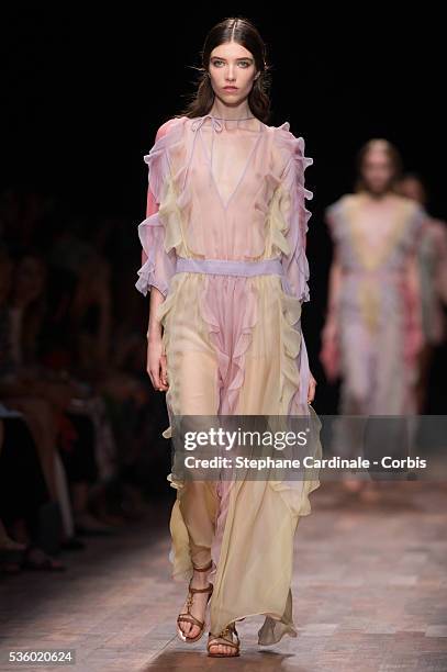 Model walks the runway during the Valentino show as part of the Paris Fashion Week Womenswear Spring/Summer 2015 on September 30, 2014 in Paris,...