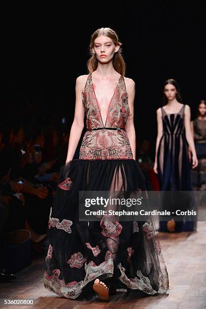 Model walks the runway during the Valentino show as part of the Paris Fashion Week Womenswear Spring/Summer 2015 on September 30, 2014 in Paris,...