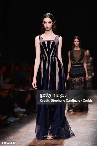 Model walks the runway during the Valentino show as part of the Paris Fashion Week Womenswear Spring/Summer 2015 on September 30, 2014 in Paris,...