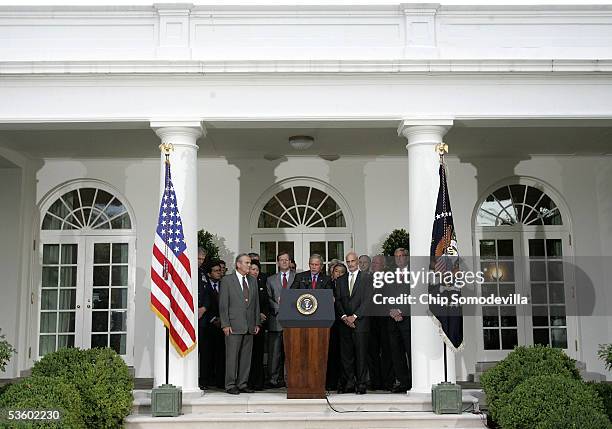 Surrounded by his cabinet in the Rose Garden at the White House, U.S. President George W. Bush makes a brief statement to the nation about the...