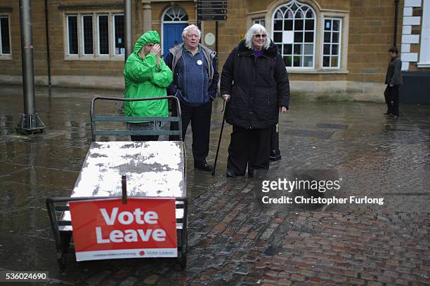 Vote Leave supporters wait in Market Square, Northampton, where UKIP leader Nigel Farage was due to talk to supporters but was cancelled due to...