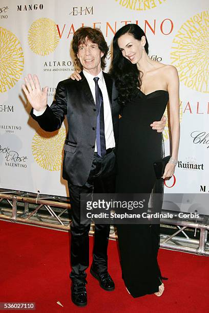 Mick Jagger and L'Wren Scott arrive at the Valentino's gala dinner held at Villa Borghese in Rome.