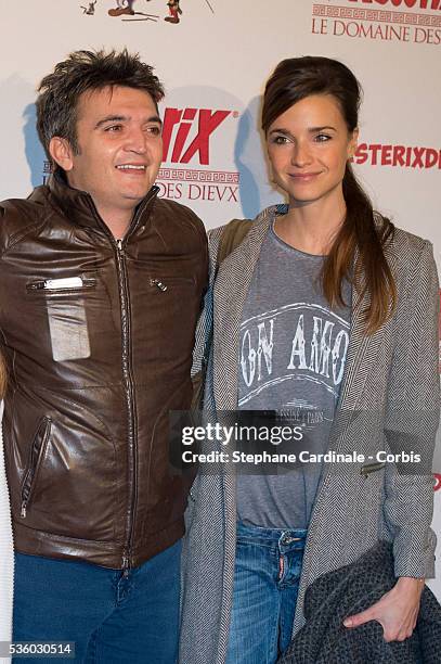 Thomas Langmann and wife Celine Bosquet attend the 'Asterix: Le Domaine des Dieux' Premiere at Le Grand Rex on November 23, 2014 in Paris, France.