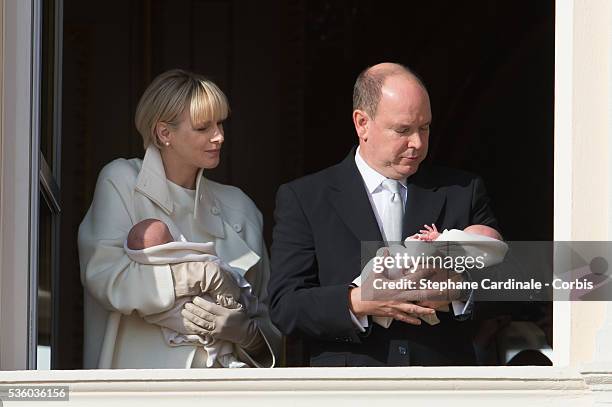 Prince Albert II of Monaco and Princess Charlene of Monaco pose with Prince Jacques and Princess Gabriella on the Balcony of the Monaco Palace on...