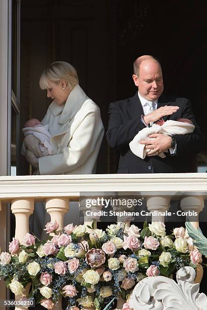 Prince Albert II of Monaco and Princess Charlene of Monaco pose with Prince Jacques and Princess Gabriella on the Balcony of the Monaco Palace on...