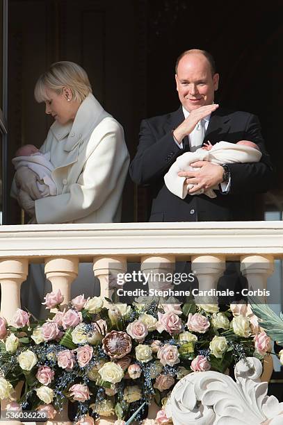 Prince Albert II of Monaco and Princess Charlene of Monaco pose with Prince Jacques and Princess Gabriella on the Balcony of the Monaco Palace on...