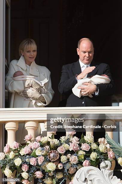 Prince Albert II of Monaco and Princess Charlene of Monaco pose with Prince Jacques and Princess Gabriella on the Balcony of the Monaco Palace on...