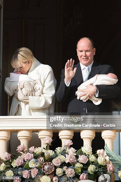 Prince Albert II of Monaco and Princess Charlene of Monaco pose with Prince Jacques and Princess Gabriella on the Balcony of the Monaco Palace on...