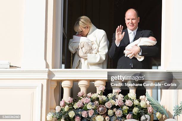 Prince Albert II of Monaco and Princess Charlene of Monaco pose with Prince Jacques and Princess Gabriella on the Balcony of the Monaco Palace on...