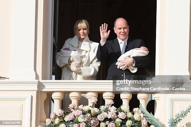 Prince Albert II of Monaco and Princess Charlene of Monaco pose with Prince Jacques and Princess Gabriella on the Balcony of the Monaco Palace on...