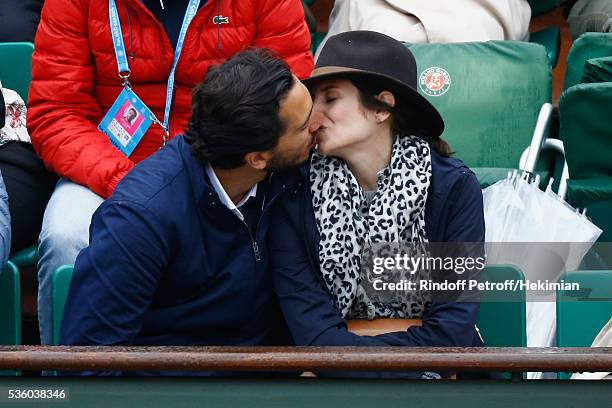 Louise Monot and her companion attend the French Tennis Open Day Ten at Roland Garros on May 31, 2016 in Paris, France.