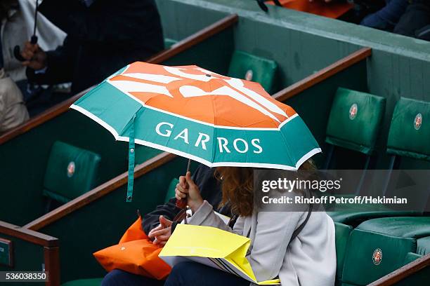 General ambiance of atmosphere of a rainy day with umbrellas in the court Chatrier pictured during the match between Novak Djokovic and Roberto...