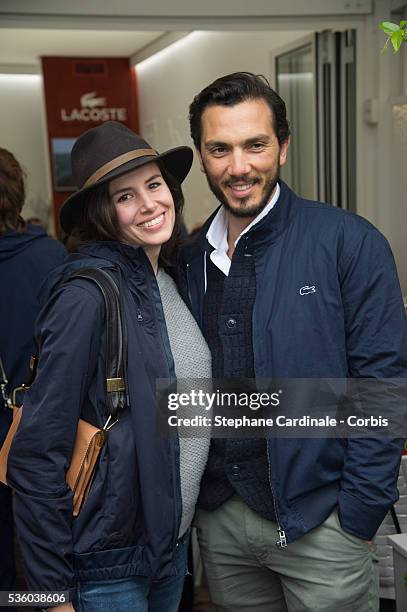 Actress Louise Monot and her companion actor Samir Boitar attend day ten of the 2016 French Open at Roland Garros on May 31, 2016 in Paris, France.