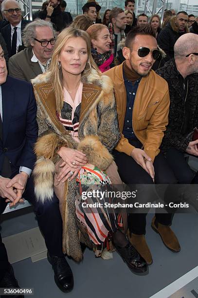 Kate Moss and Hidetoshi Nakata attend the Louis Vuitton Menswear Fall/Winter 2015-2016 show as part of Paris Fashion Week on January 22, 2015 in...