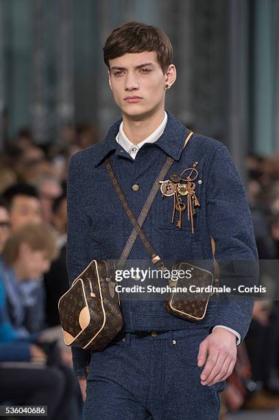 Model walks the runway during the Louis Vuitton Menswear Fall/Winter 2015-2016 show as part of Paris Fashion Week on January 22, 2015 in Paris,...