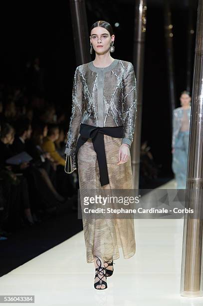 Model walks the runway during the Giorgio Armani Prive show as part of Paris Fashion Week Haute Couture Spring/Summer 2015 on January 27, 2015 in...