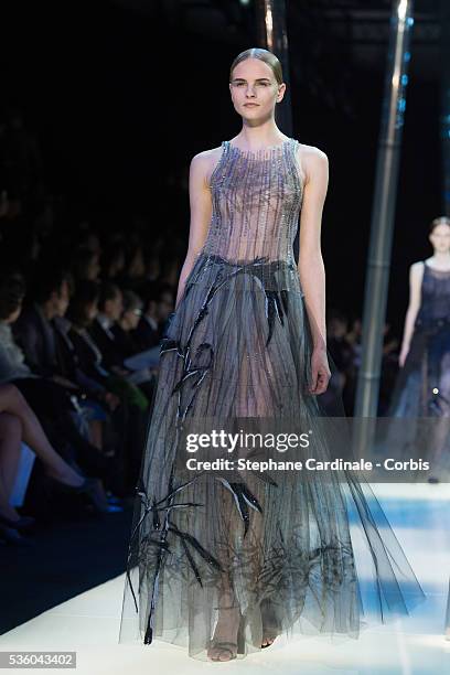 Model walks the runway during the Giorgio Armani Prive show as part of Paris Fashion Week Haute Couture Spring/Summer 2015 on January 27, 2015 in...